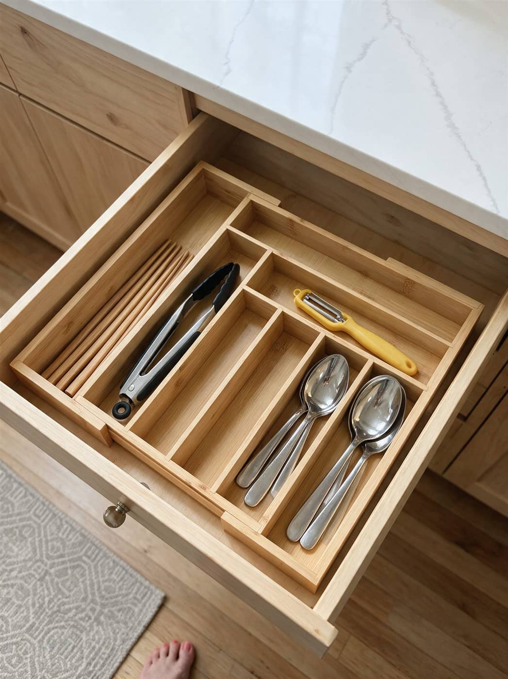 Angled view of bamboo drawer organizer