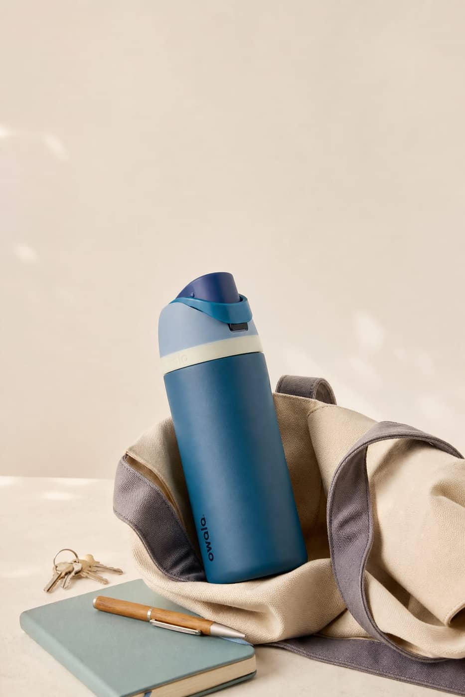 Owala bottle packed in a tote bag