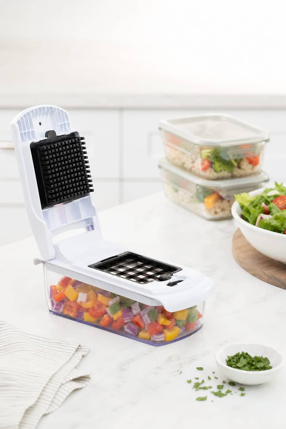 Fullstar chopper with diced vegetables in the container