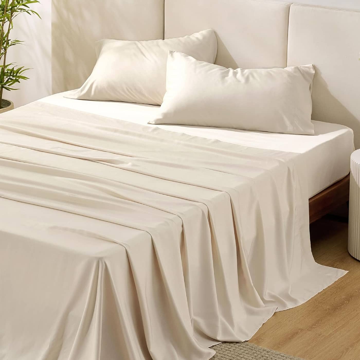 Bedsure light beige sheet set on a made bed